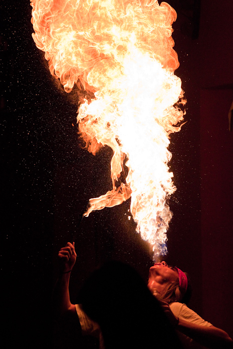 When I sat down to eat in, a fire breather started performing across the street. I've never taken photos of fire breathing before, and I didn't leave my tableâ€¦